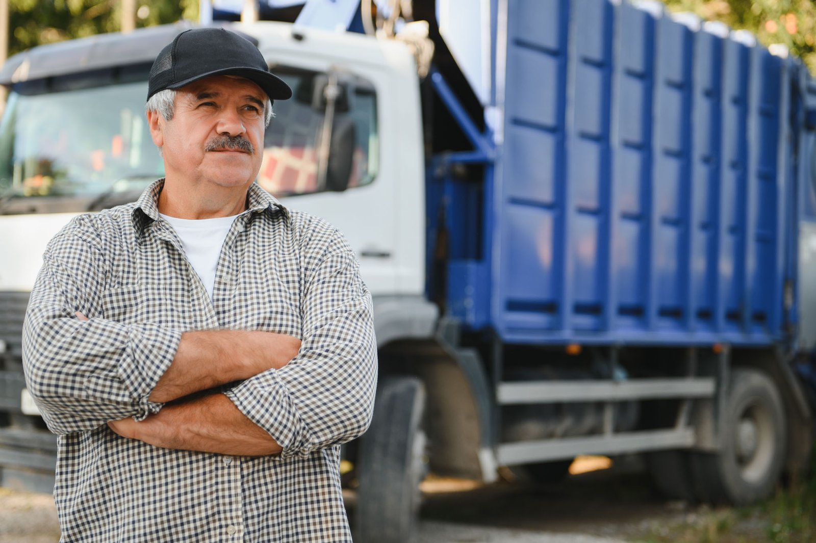 Portrait of a male garbage truck driver