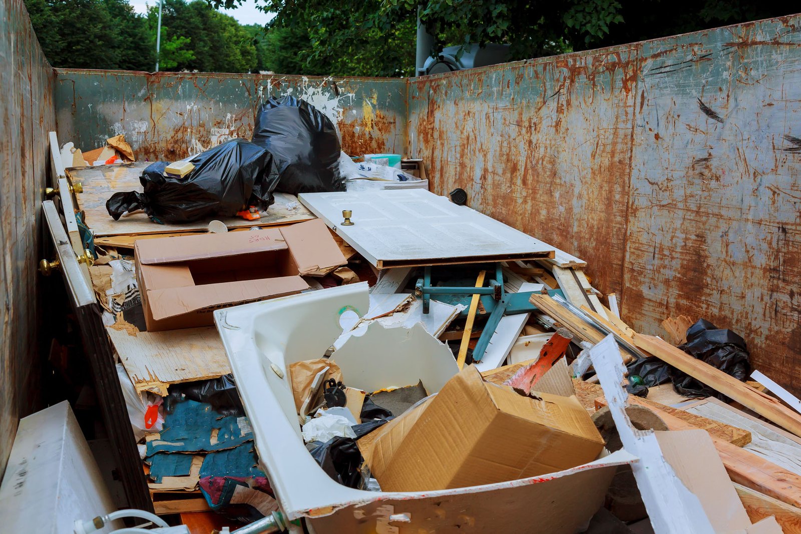 container Over flowing Dumpsters being full with garbage
